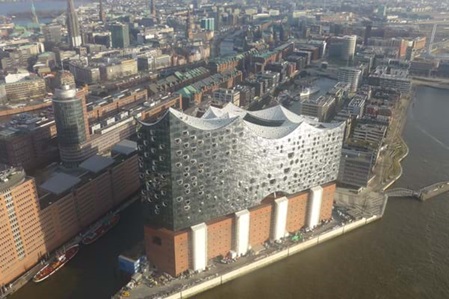 Birds view of Elbphilharmonie. The round aluminium plates are anodized and powder coated.